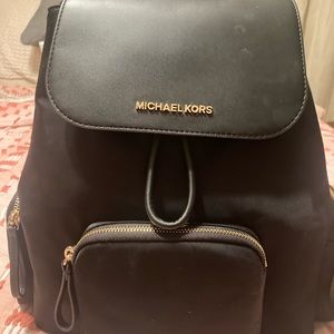 Michael Kors back pack . Never used